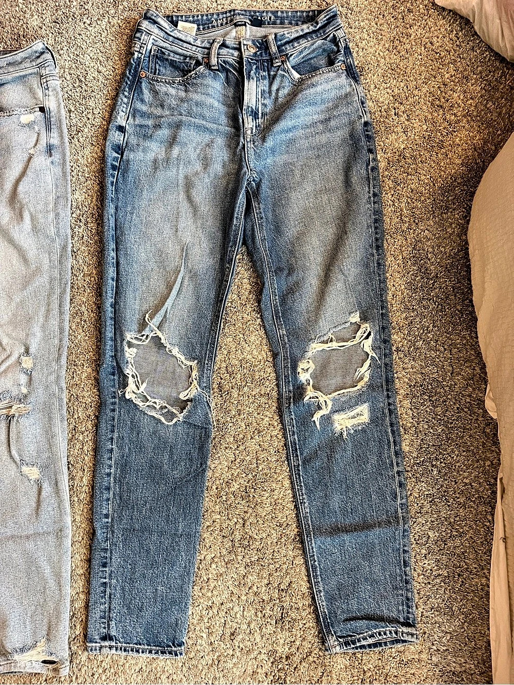 Distressed Blue Jeans